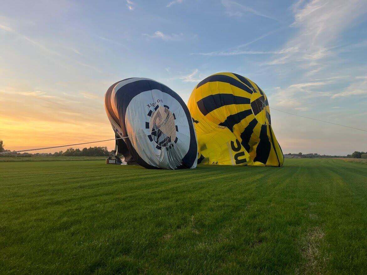 Balloons deflating at sunset